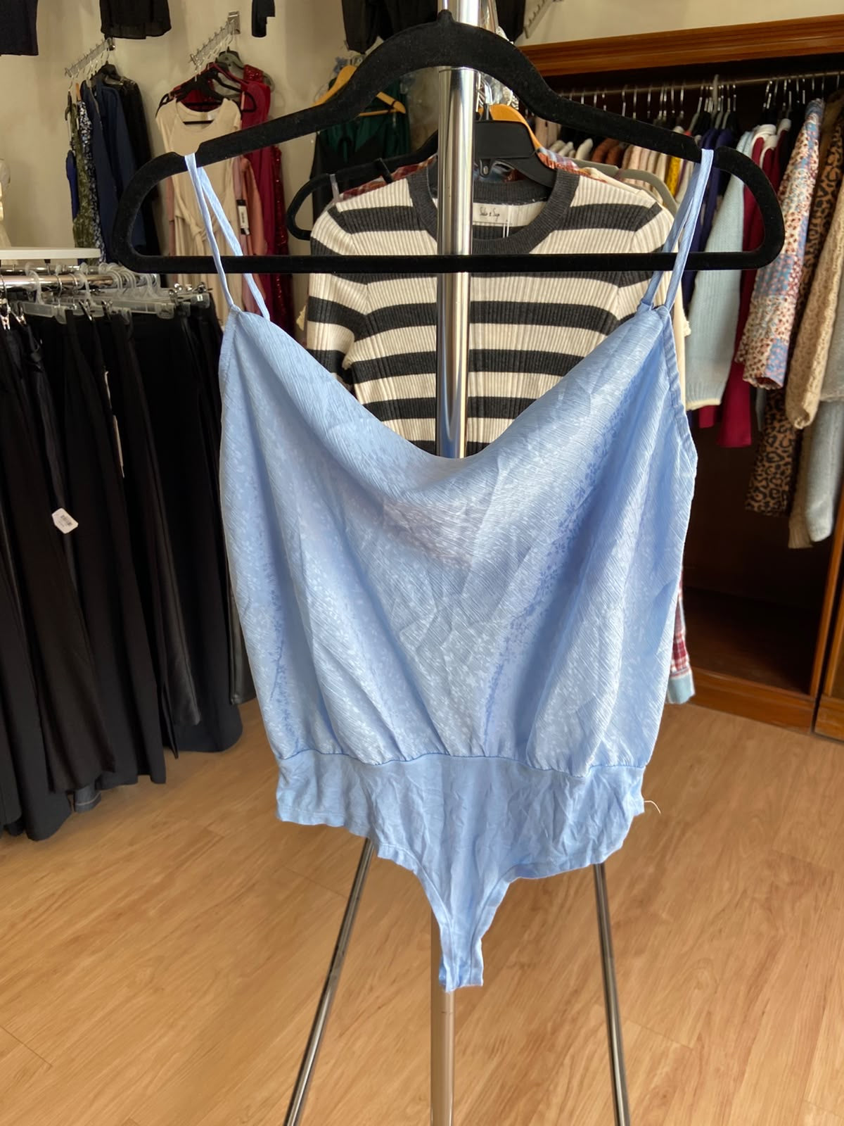 Light Blue Spaghetti Strap Romper with Ruffled Hem