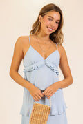 Camisola Azul con Volantes y Tela Airflow