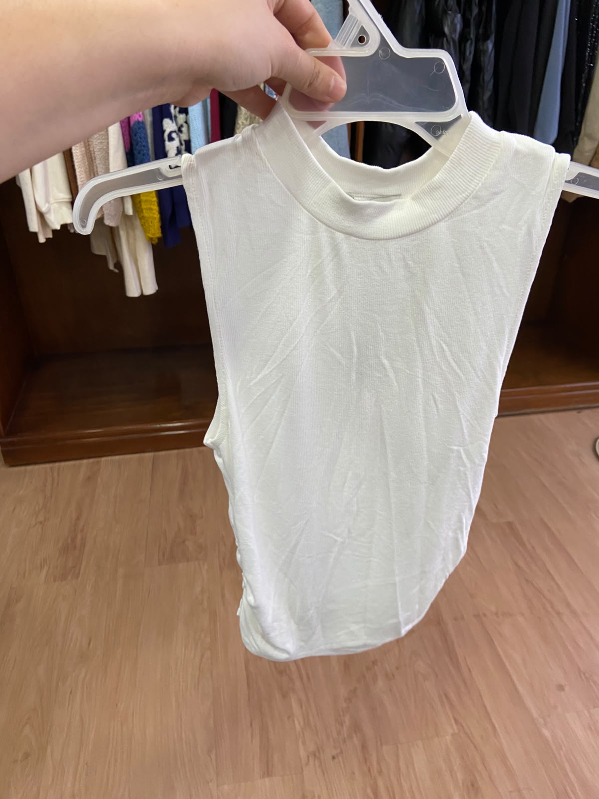 White Sleeveless Mock Neck Top with Fitted Silhouette