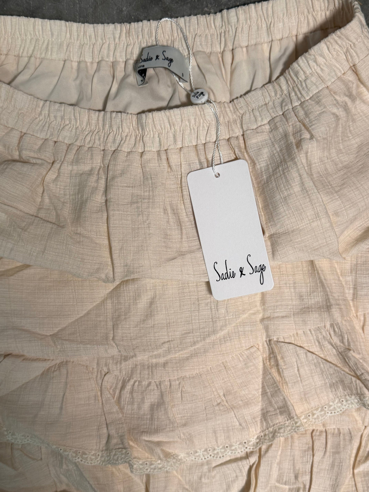 Cream Tiered Mini Skirt with Ruffled Hem