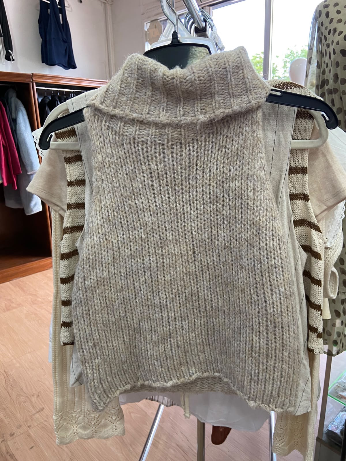 Cream Mock Neck Sleeveless Sweater with Ribbed Detail