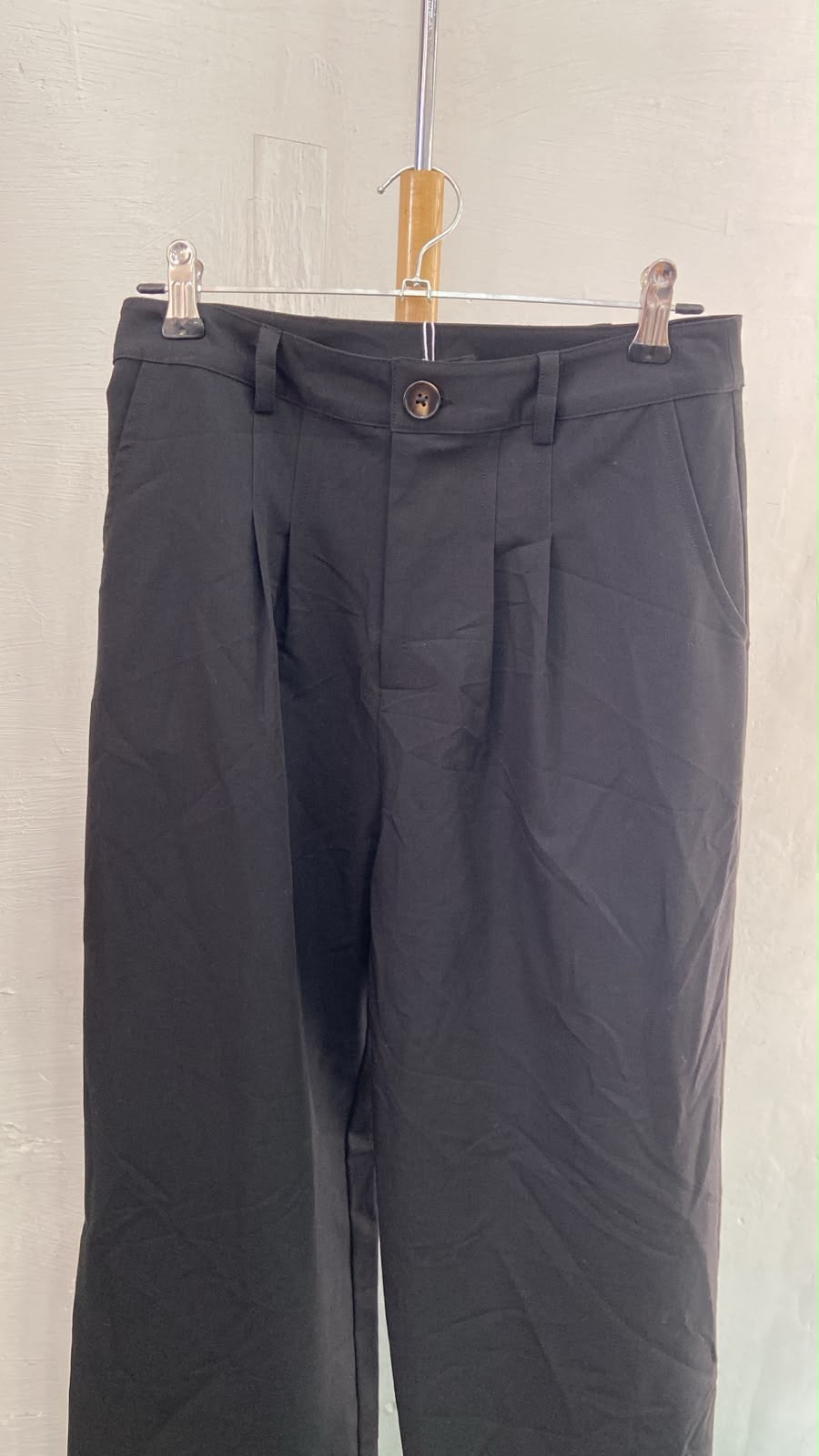 Black Pleated Trousers with Button Detail