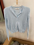 Light Blue Knit Button-Up Cardigan with Textured Pattern