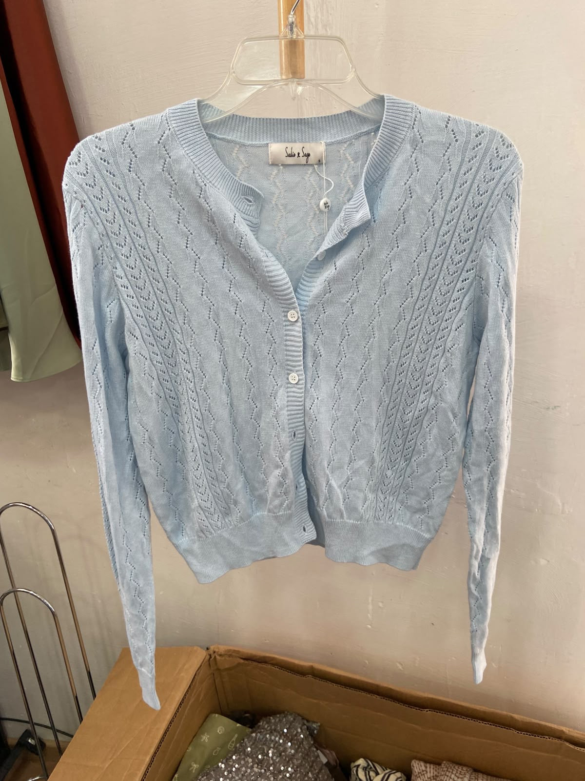 Light Blue Knit Button-Up Cardigan with Textured Pattern