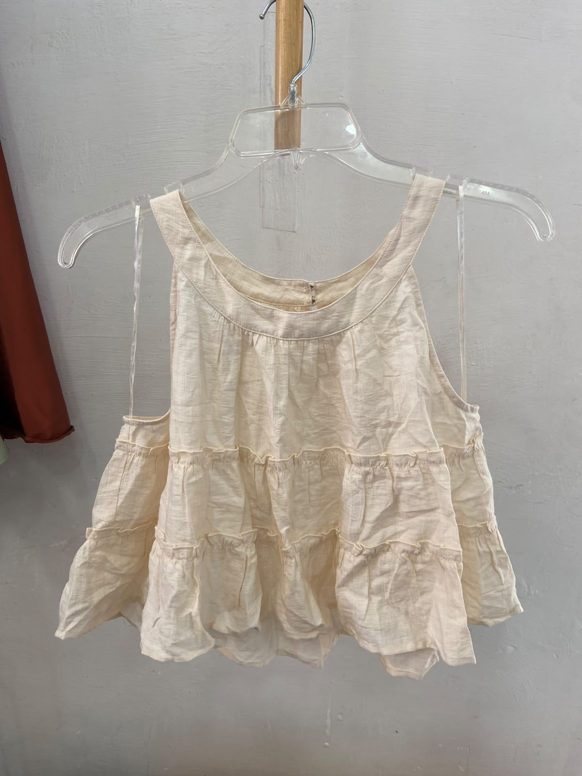 Cream Tiered Sleeveless Top with Ruffled Hem