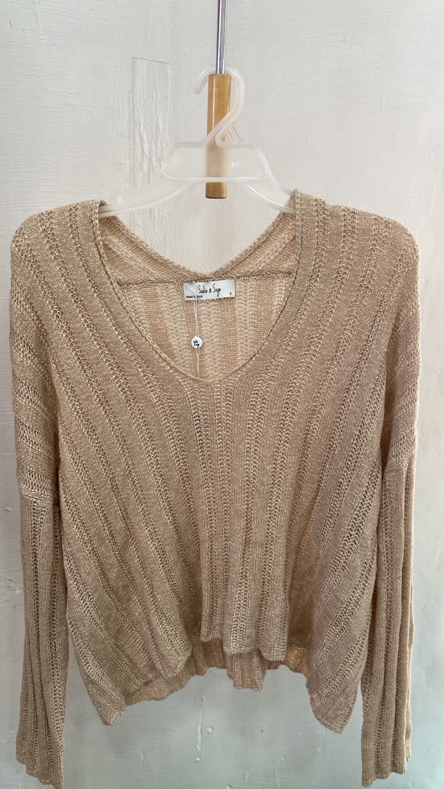 Beige Knit V-Neck Sweater with Ribbed Texture
