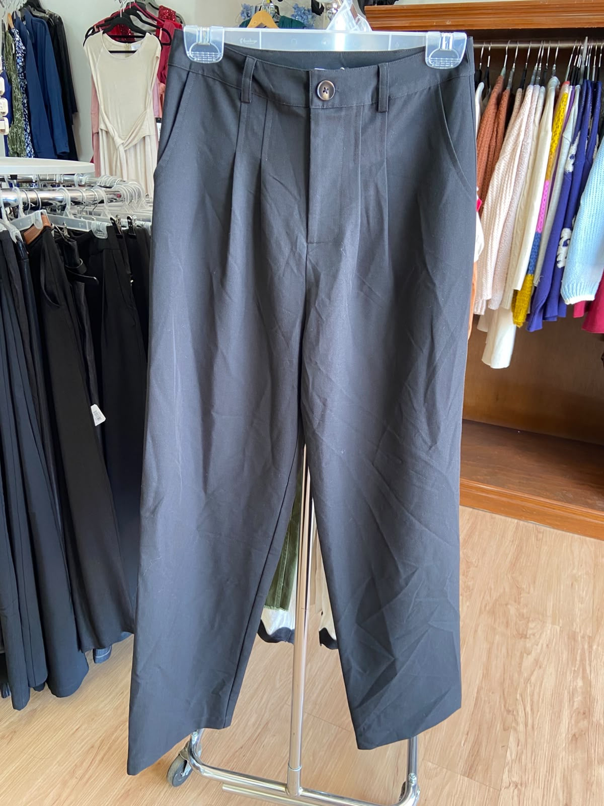 Black Pleated Trousers with Button Detail