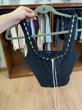 Black Sleeveless Top with Decorative Trim