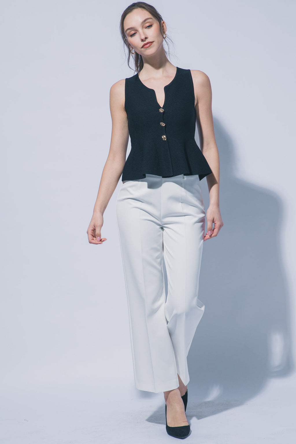 Blusa Peplum de Punto con Botones al Frente en Color Negro