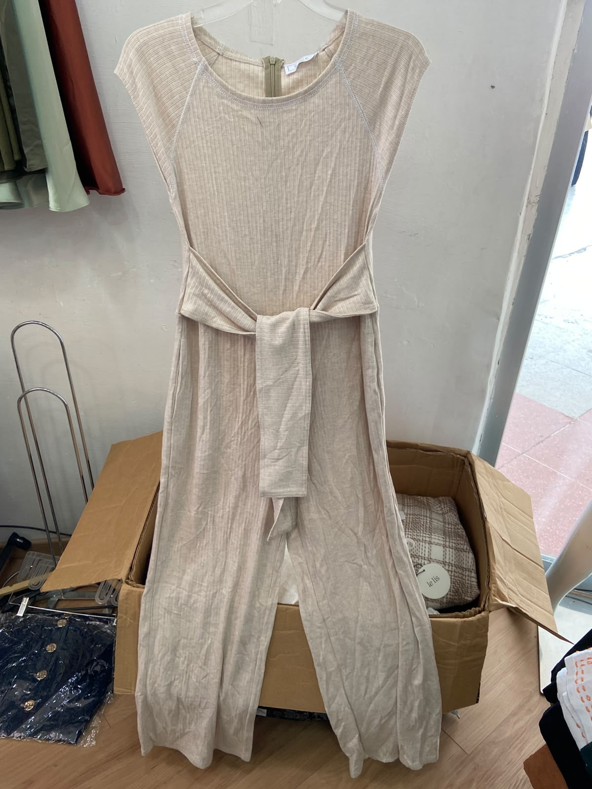 Beige Sleeveless Jumpsuit with Tie Detail