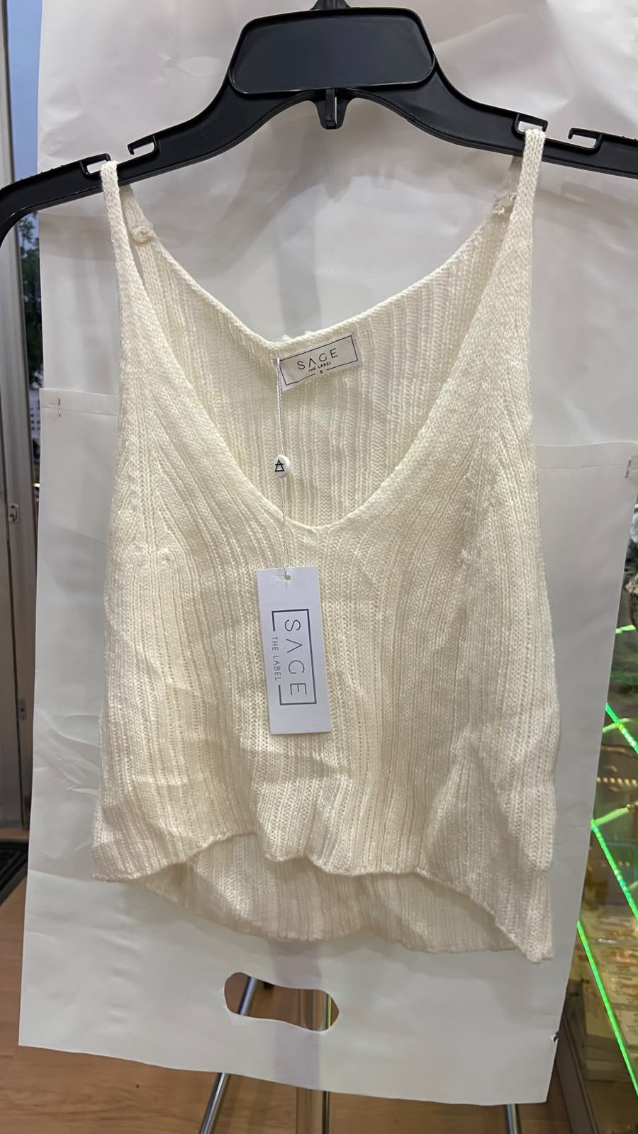 Sage Sleeveless V-Neck Knit Top with Flowy Hem