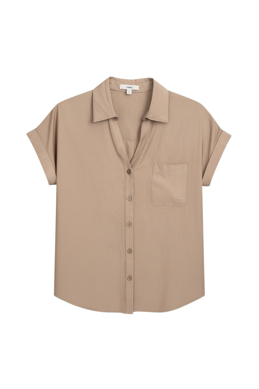 Yanet Collection Shop beige short sleeve button-up shirt with a classic collar, chest pocket, and relaxed crinkled fit.
