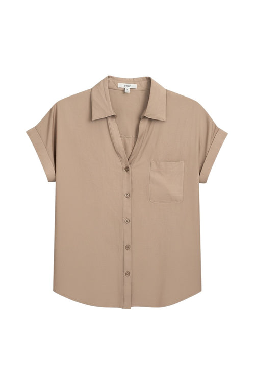 Yanet Collection Shop beige short sleeve button-up shirt with a classic collar, chest pocket, and relaxed crinkled fit.