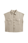 Yanet Collection Shop beige short sleeve button-up top with a classic collar and two front pockets in textured fabric.
