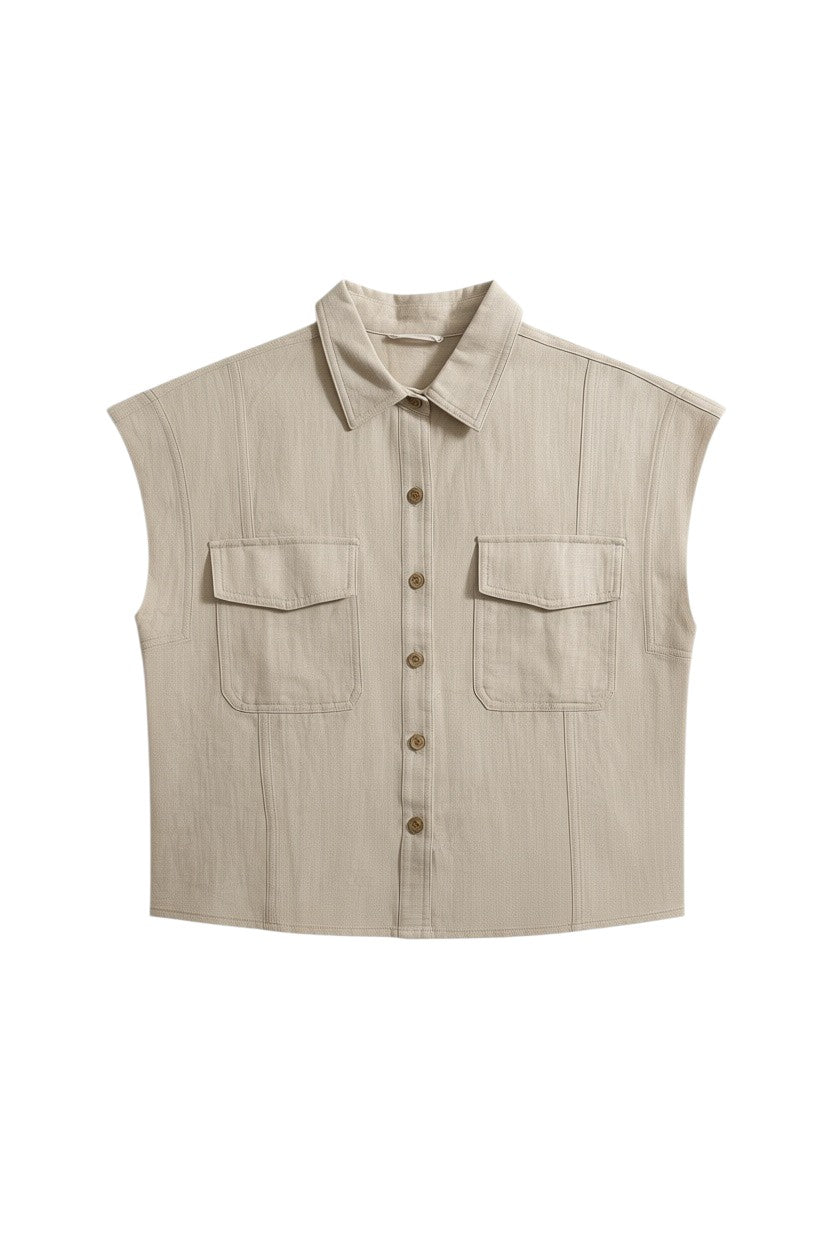 Yanet Collection Shop beige short sleeve button-up top with a classic collar and two front pockets in textured fabric.