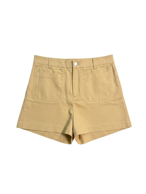 Yanet Collection Shop beige high-waisted cotton shorts with front patch pockets and a button fly closure.