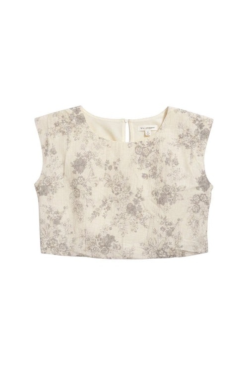 Yanet Collection Shop beige crop top with grey floral print, round neckline, and textured fabric