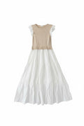 Yanet Collection Shop beige knit bodice maxi dress with a white tiered skirt and ruffled sleeves.