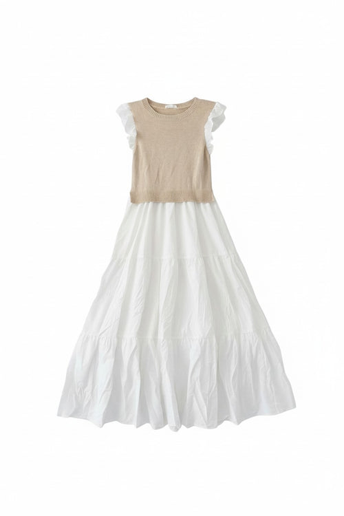 Yanet Collection Shop beige knit bodice maxi dress with a white tiered skirt and ruffled sleeves.