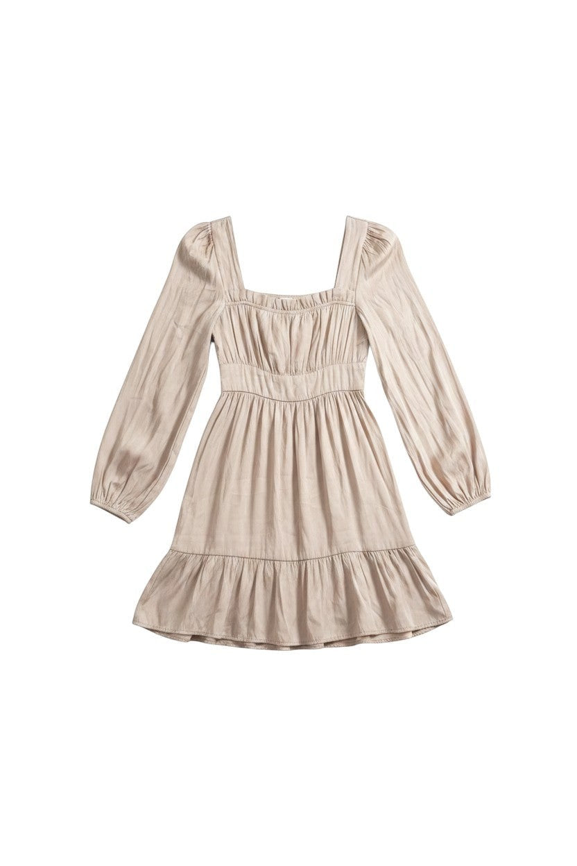Yanet Collection Shop beige mini dress with square neckline, puff sleeves, and a tiered skirt in soft textured fabric.