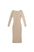 Yanet Collection Shop beige long sleeve maxi dress with a v-neckline and ribbed texture in a form-fitting style.