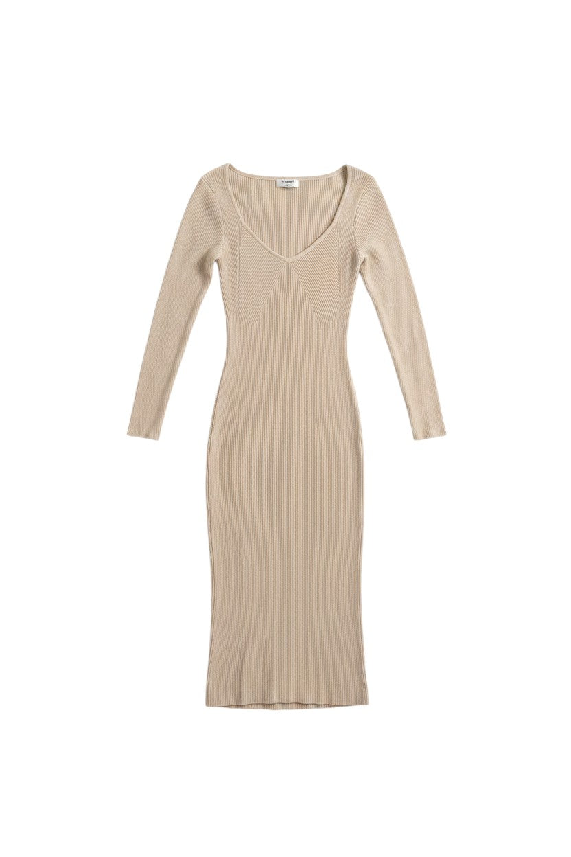 Yanet Collection Shop beige long sleeve maxi dress with a v-neckline and ribbed texture in a form-fitting style.