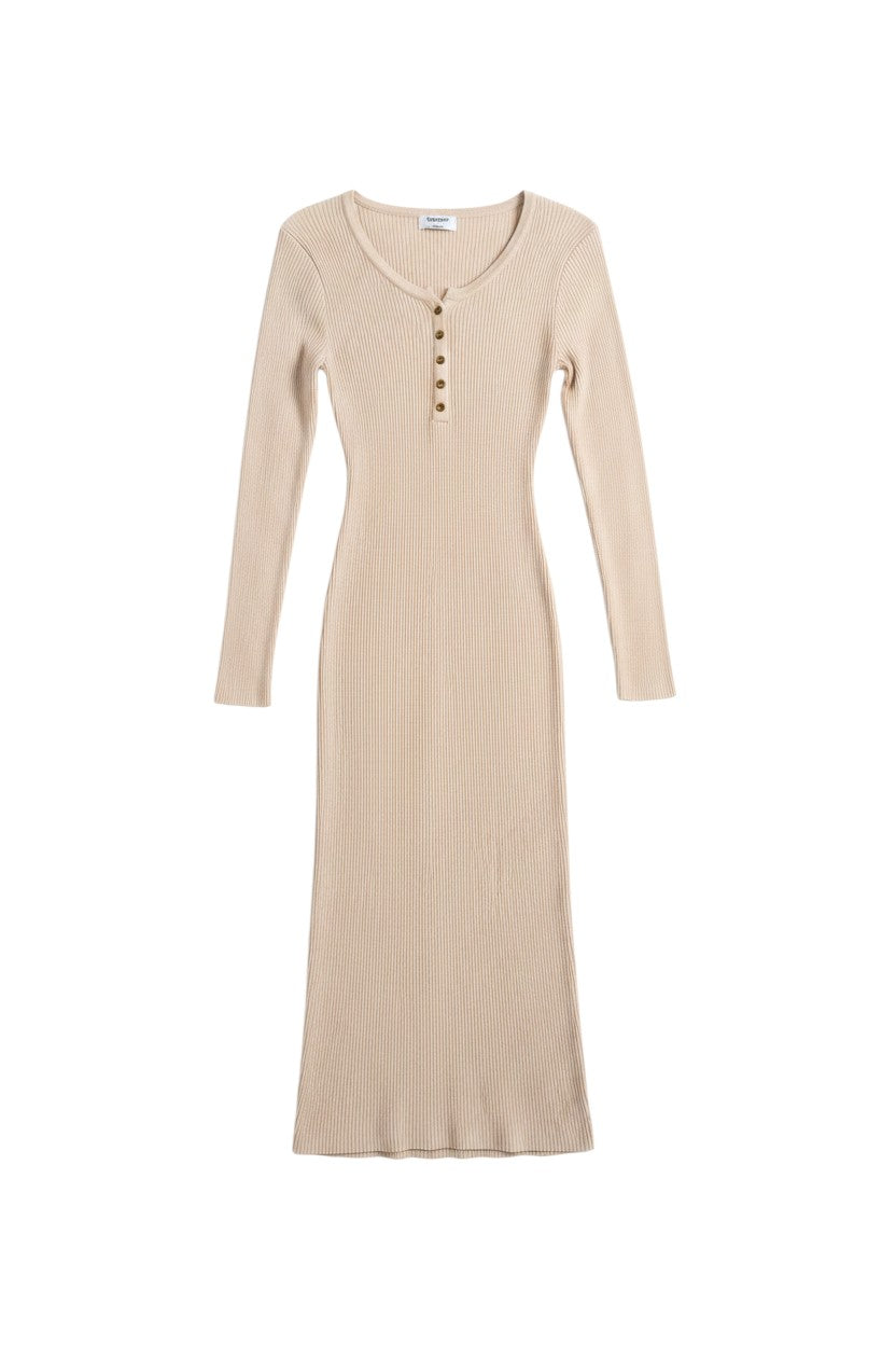 Yanet Collection Shop beige long sleeve ribbed maxi dress with button front detailing and a round neckline.