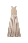 Yanet Collection Shop beige sleeveless maxi dress with a ribbed bodice and a flowy flared skirt.