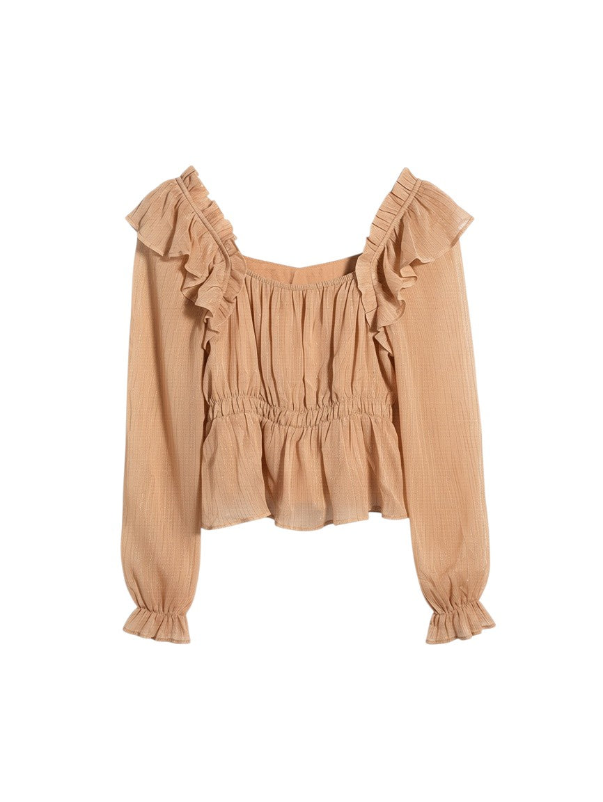 Yanet Collection Shop beige long-sleeve blouse with ruffled shoulders, square neckline, and cinched waist.