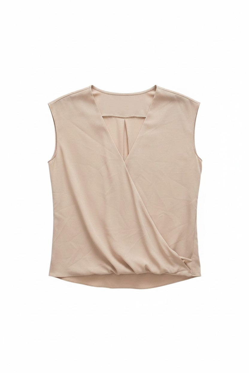 Yanet Collection Shop beige sleeveless wrap top with a flattering gathered hem and draped silhouette