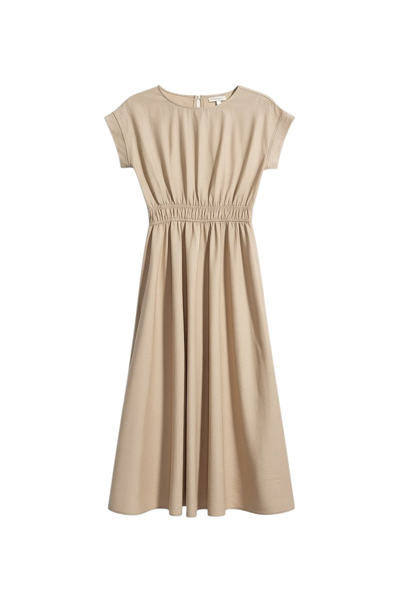 Yanet Collection Shop beige short sleeve maxi dress with a flattering smocked waist and relaxed fit.