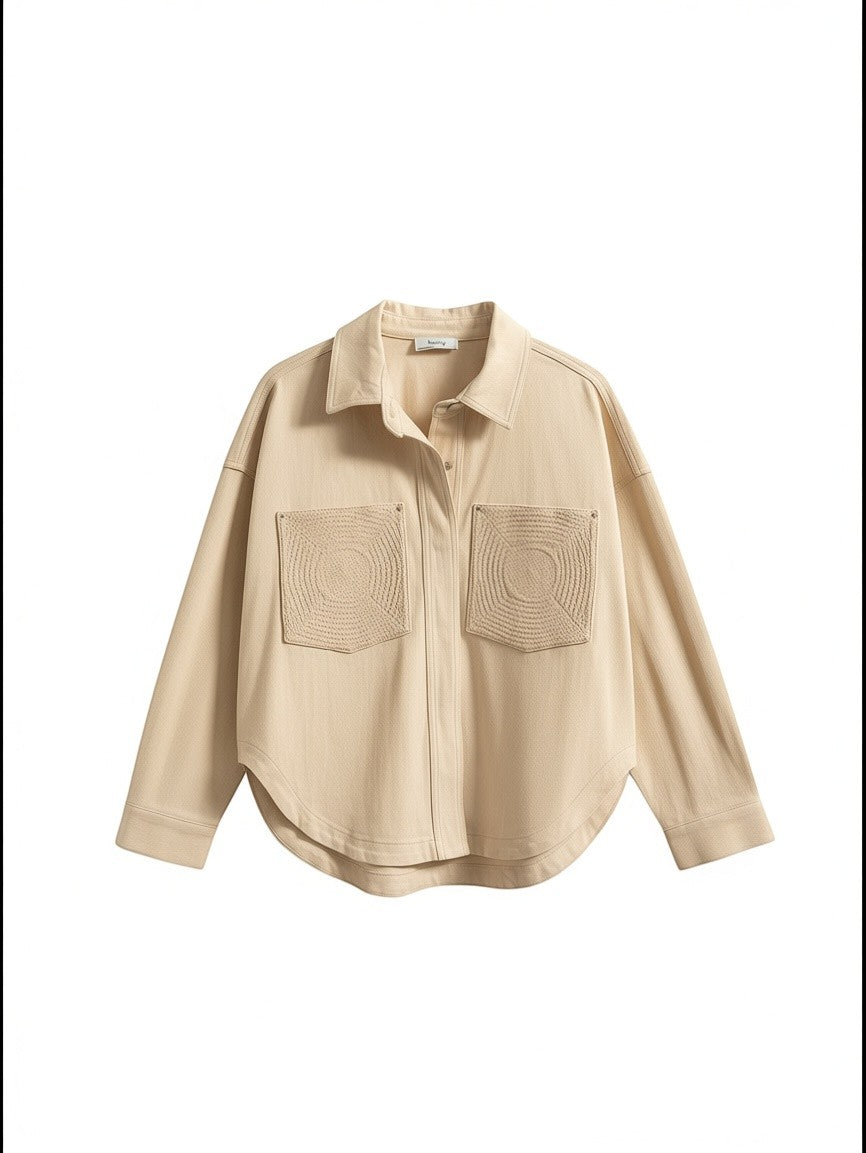 Yanet Collection Shop beige button-down jacket with textured circular pattern pockets and a curved hemline.