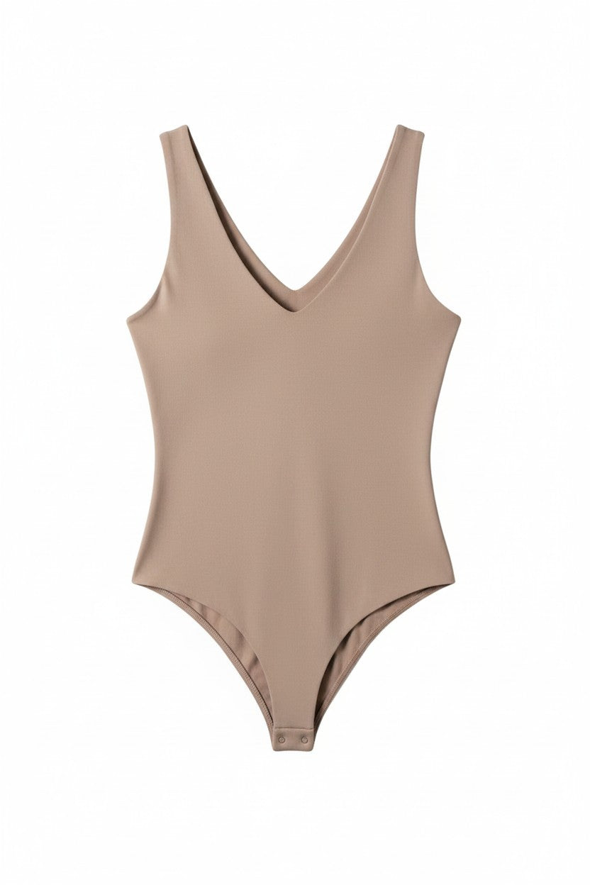 Yanet Collection Shop beige sleeveless v-neck bodysuit in a fitted stretch fabric with a snap closure