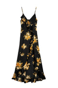 Yanet Collection Shop black maxi dress with yellow floral print, spaghetti straps, and a ruffled high-low hem.