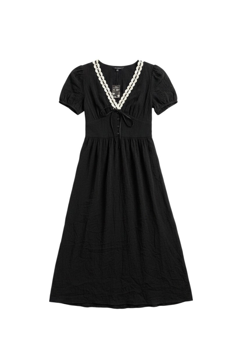Yanet Collection Shop black maxi dress with short sleeves, white lace neckline trim, and a button-down front.