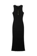 Yanet Collection Shop black sleeveless ribbed maxi dress with a round neckline and front button detail.