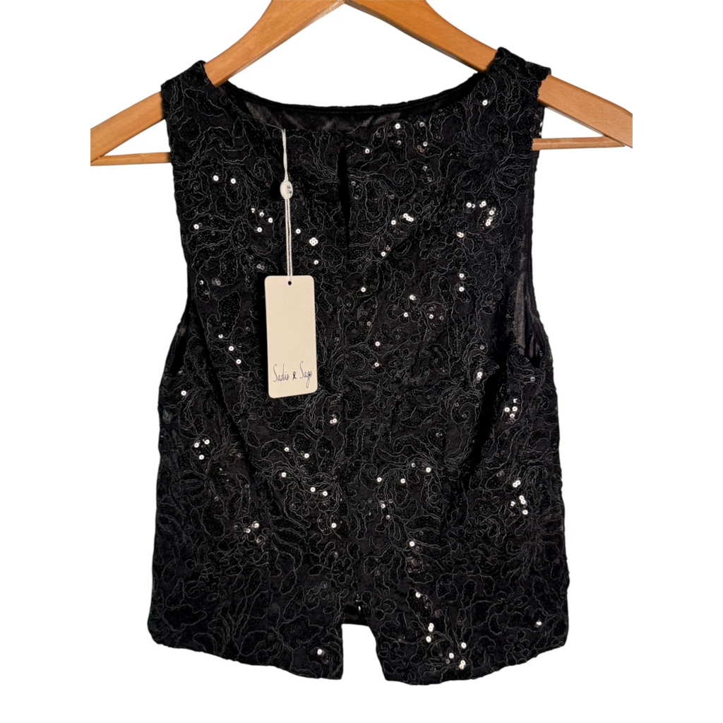 Yanet Collection Shop black sleeveless top featuring intricate lace overlay with subtle sequin embellishments