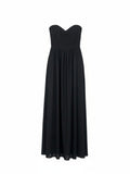 Yanet Collection Shop black strapless maxi dress featuring a fitted ruffled bodice and a flowing floor-length skirt.