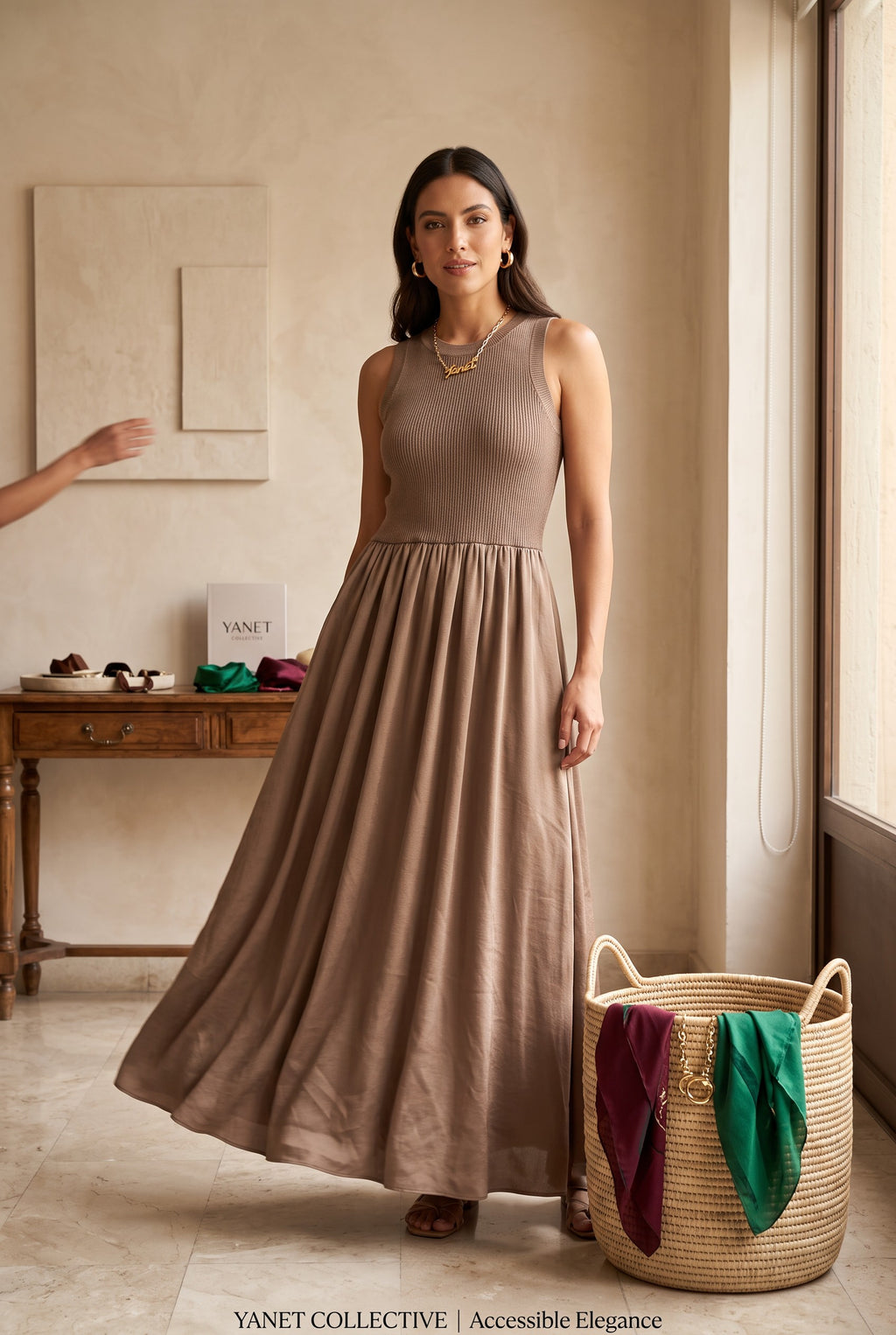 Yanet Collection Shop brown sleeveless maxi dress with a ribbed bodice and flowy skirt worn by a model indoors