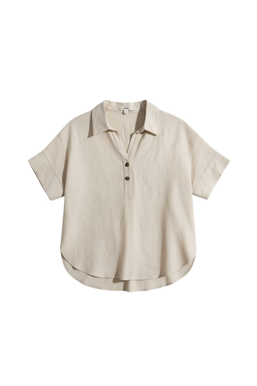 Yanet Collection Shop cream short sleeve button-up top with a classic collar and relaxed fit in lightweight fabric.