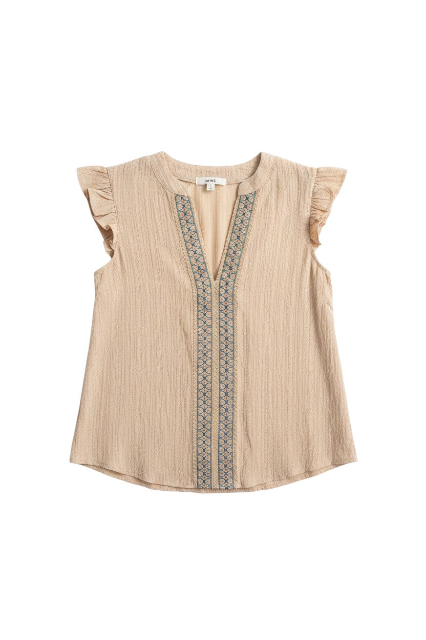Yanet Collection Shop cream flutter sleeve top with v-neckline, textured fabric, and blue embroidered front detail.