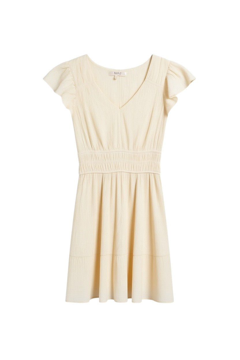 Yanet Collection Shop cream short dress with v-neckline, flutter sleeves, and a tiered skirt in textured fabric.