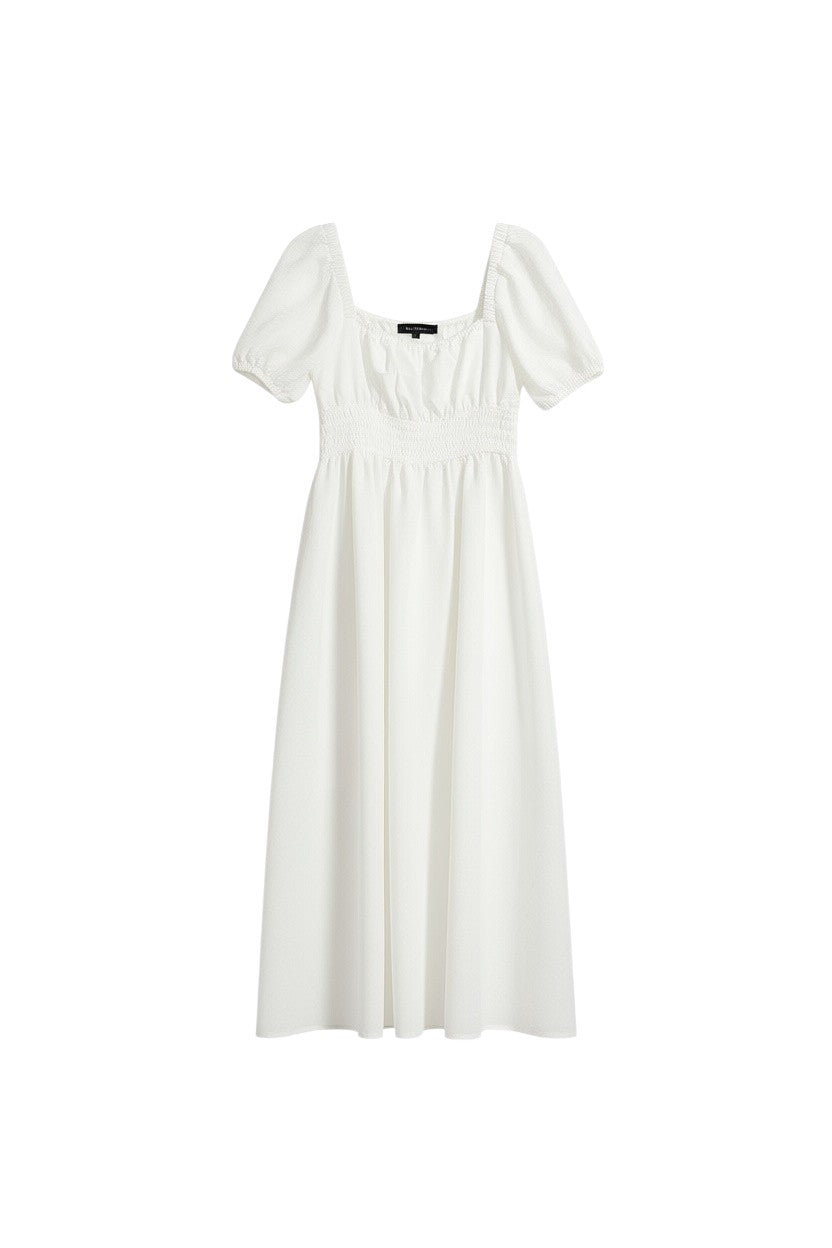 Yanet Collection Shop cream maxi dress with short puff sleeves and a smocked bodice in a lightweight draped fabric.