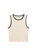 Yanet Collection Shop cream ribbed sleeveless crop top with a decorative black scalloped trim on neckline and armholes.