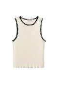 Yanet Collection Shop cream sleeveless ribbed top with a scalloped black trim along the crew neckline and armholes.