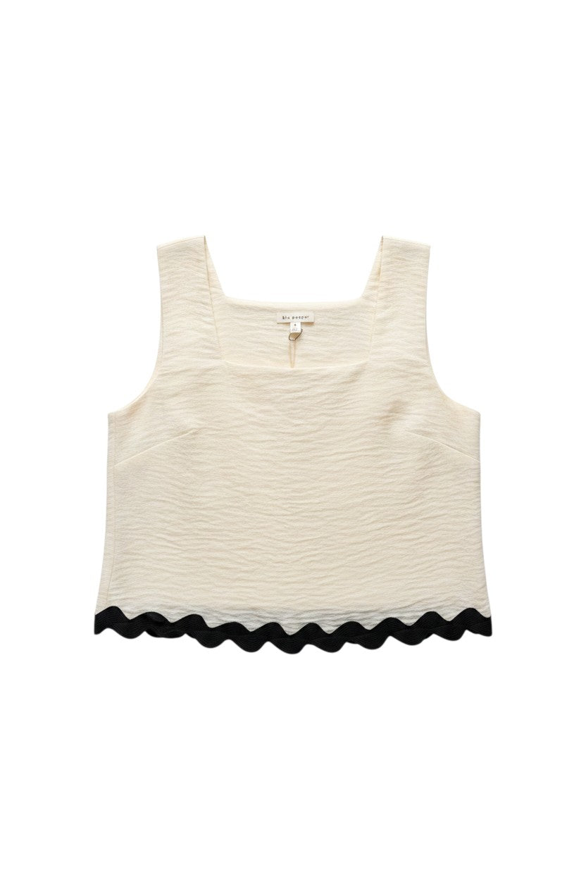 Yanet Collection Shop cream sleeveless crop top with a square neckline and a contrasting black scalloped hem.