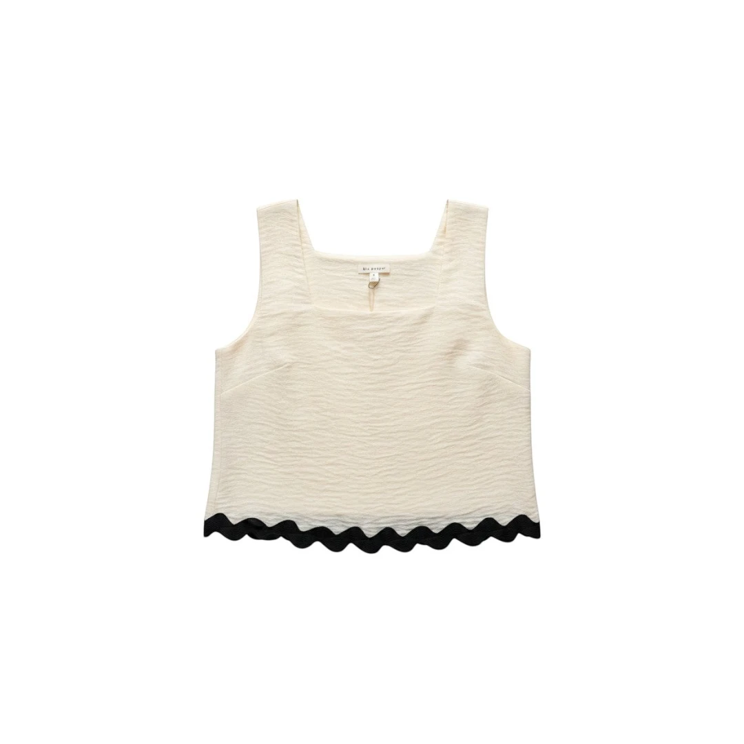 Yanet Collection Shop cream sleeveless crop top with square neckline, textured fabric, and black scalloped hem.