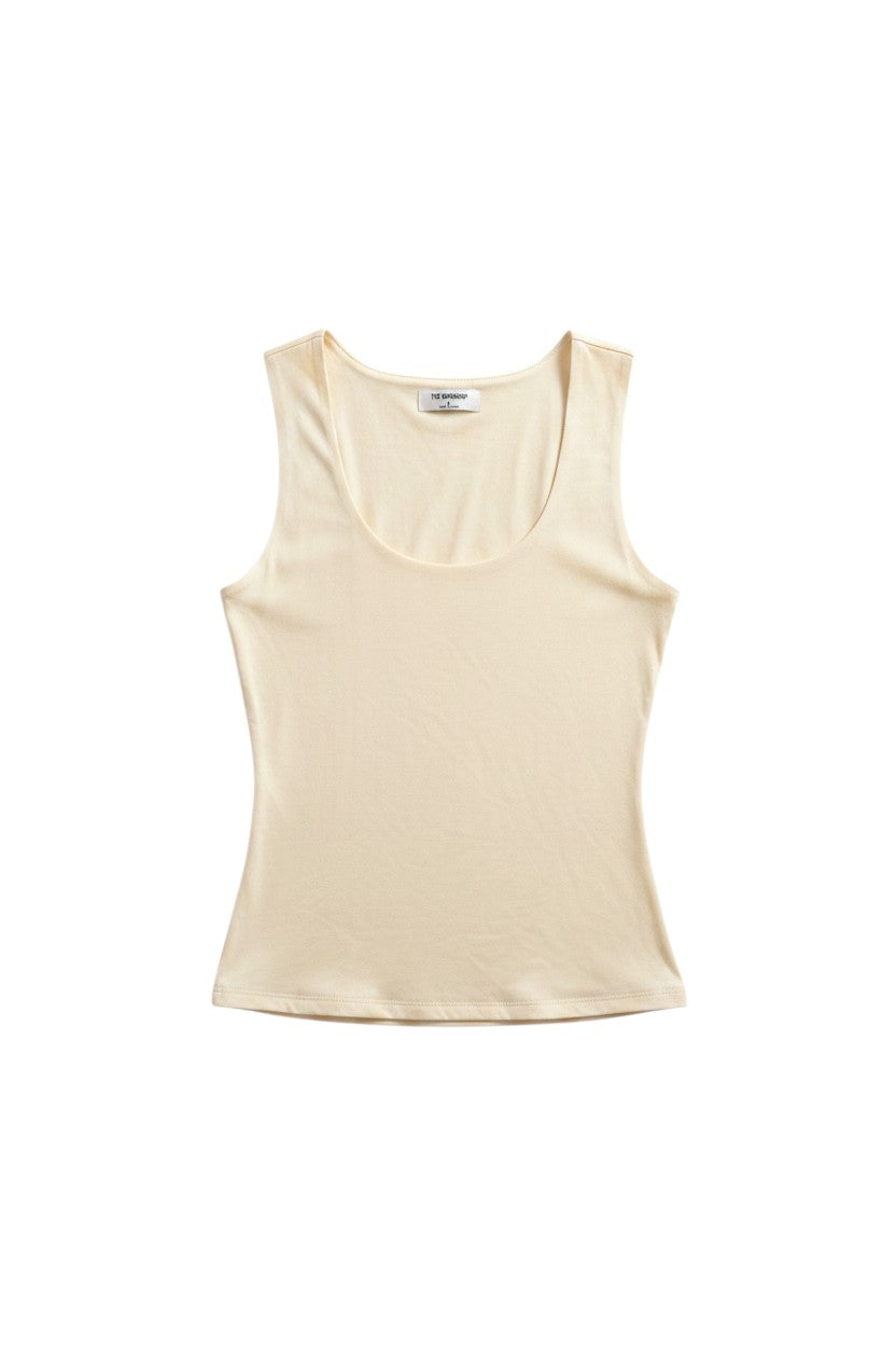 Yanet Collection Shop cream fitted tank top with a scoop neckline in soft, stretchy fabric for versatile layering.