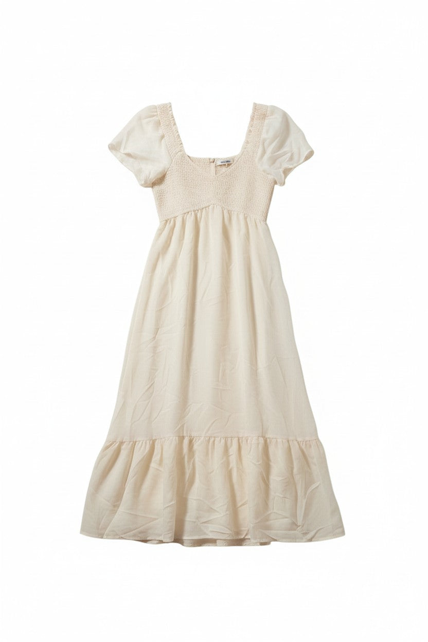 Yanet Collection Shop cream maxi dress with short flutter sleeves, smocked bodice, and a playful ruffled hem.