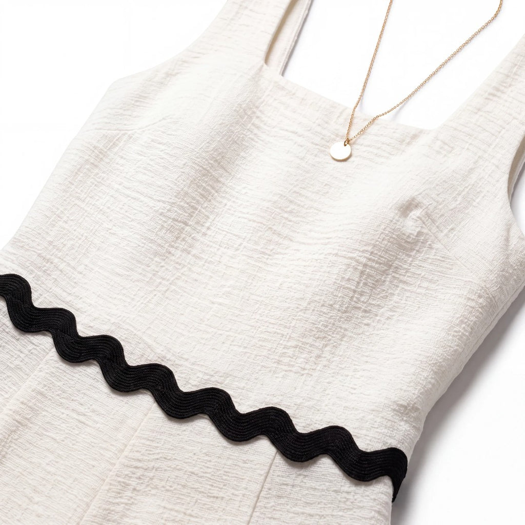 Yanet Collection Shop cream textured sleeveless crop top with square neckline and black scalloped trim detail